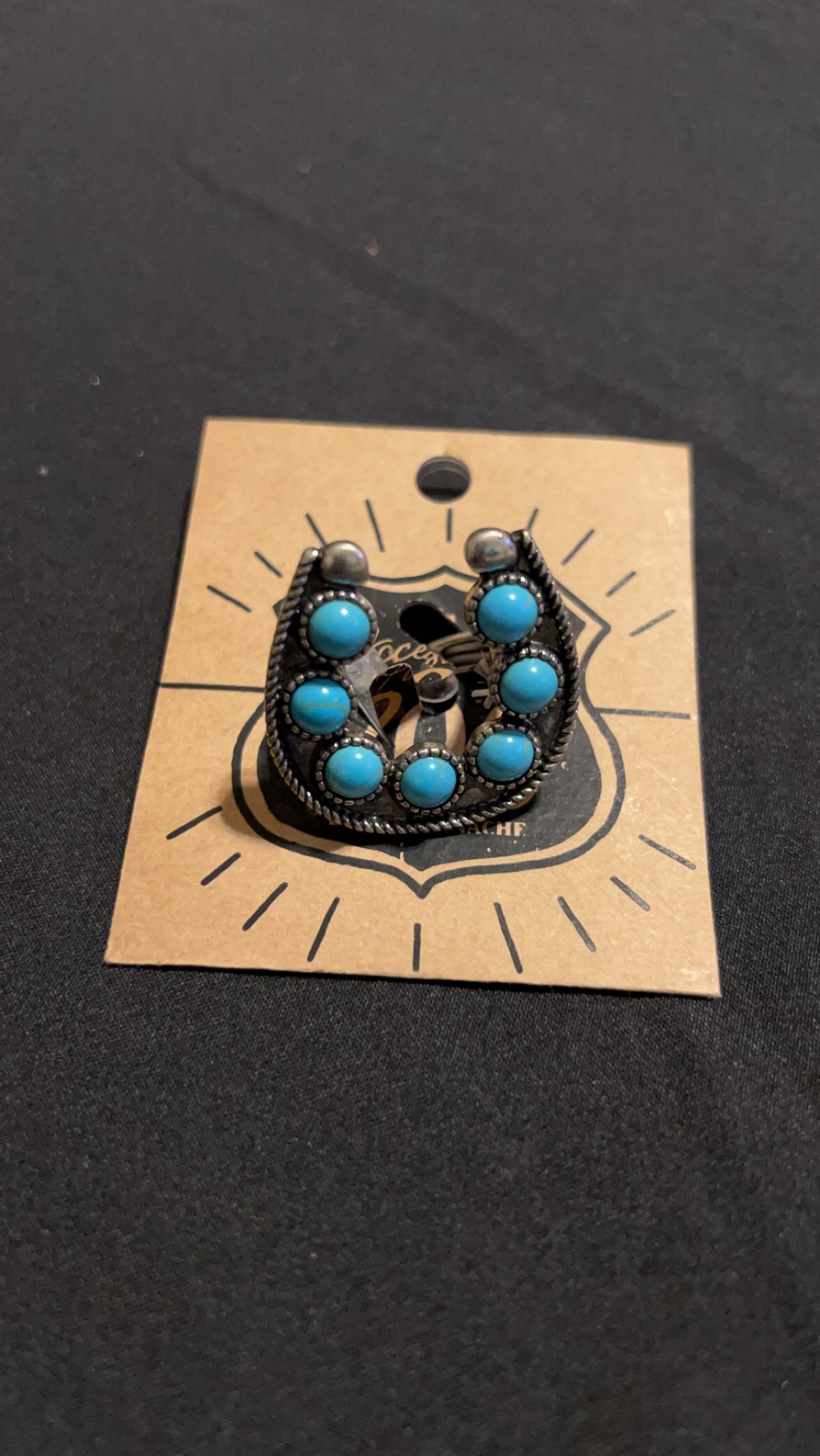 Adjustable horseshoe ring