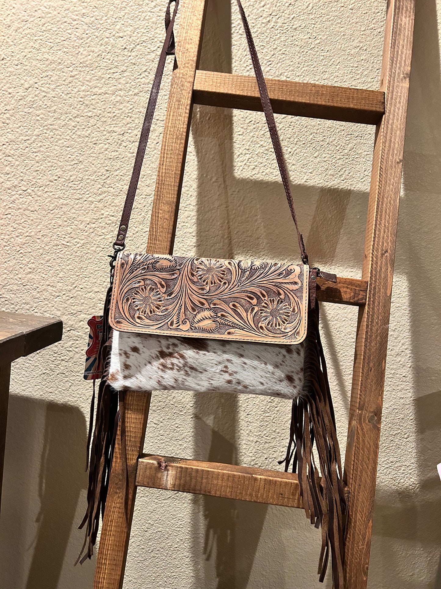 Ohlay tooled Flap & Cowhide